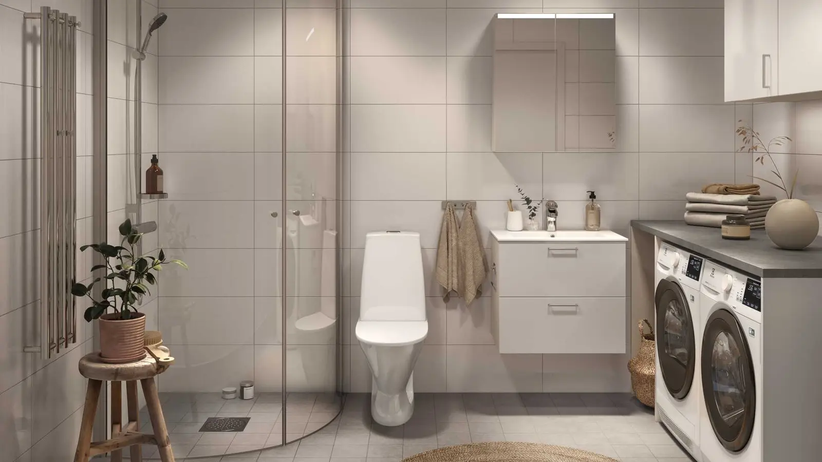 Badrum med duschhörna och tvättmaskin och torktumlare